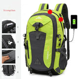 Green waterproof hiking backpack with USB charging port and reinforced straps