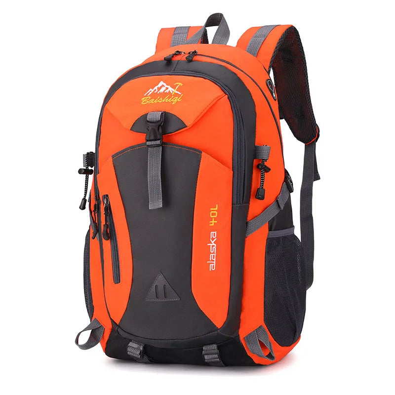 Orange waterproof outdoor climbing backpack for adventure trips