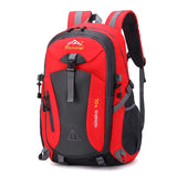 Red waterproof camping backpack for trekking and travel
