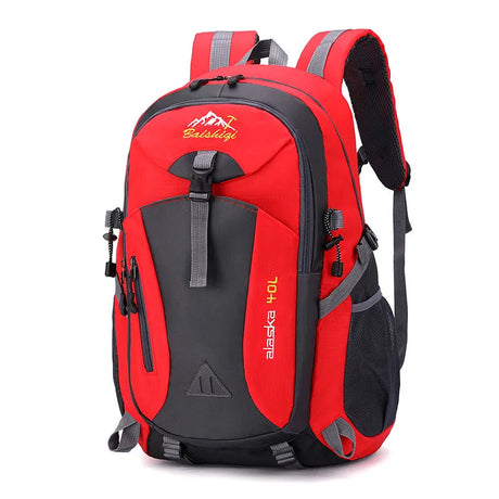Red waterproof camping backpack for trekking and travel